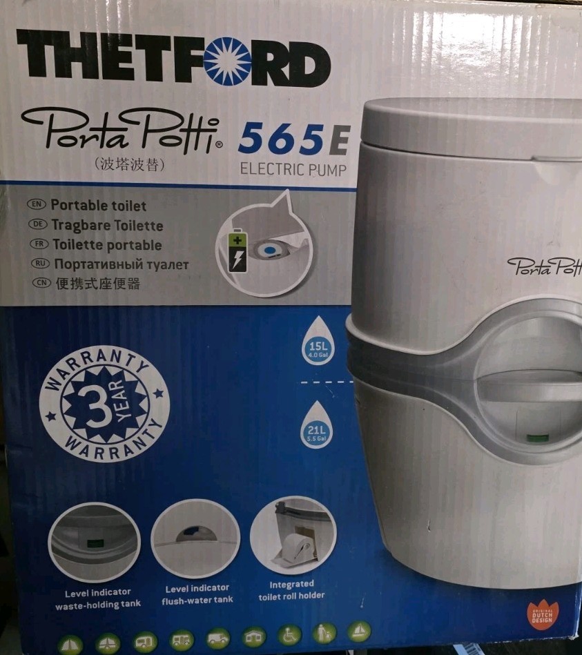 Thetford Porta Potti 565E Curve Portable Toilet w/ Hold Down Kit Included